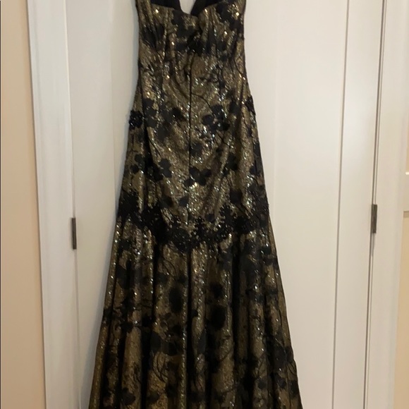 Strapless black and gold ball gown with train. - Picture 3 of 5